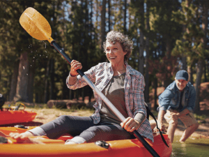 A woman having fun in a kayak