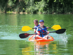Happy children in a kayak