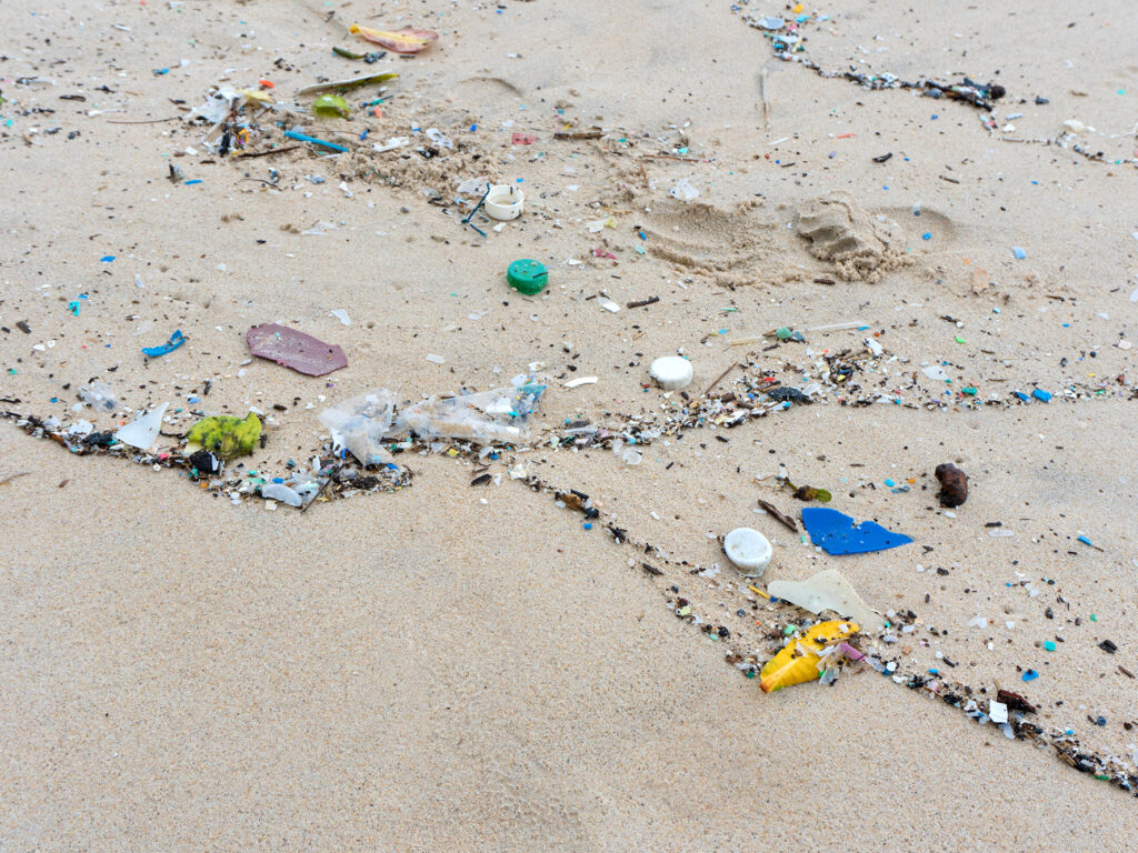 Plastic waste environment pollution on Mai Khao Beach, Phuket, Thailand.