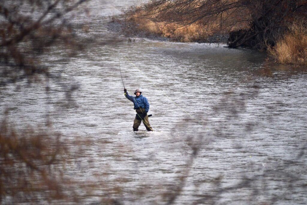 Man fly fishing in Umatilla River